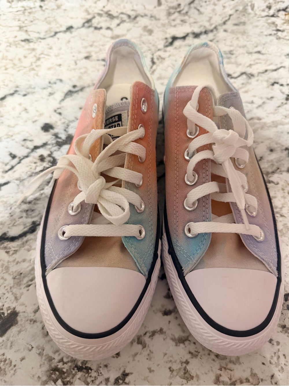 Converse tye dye sneakers .